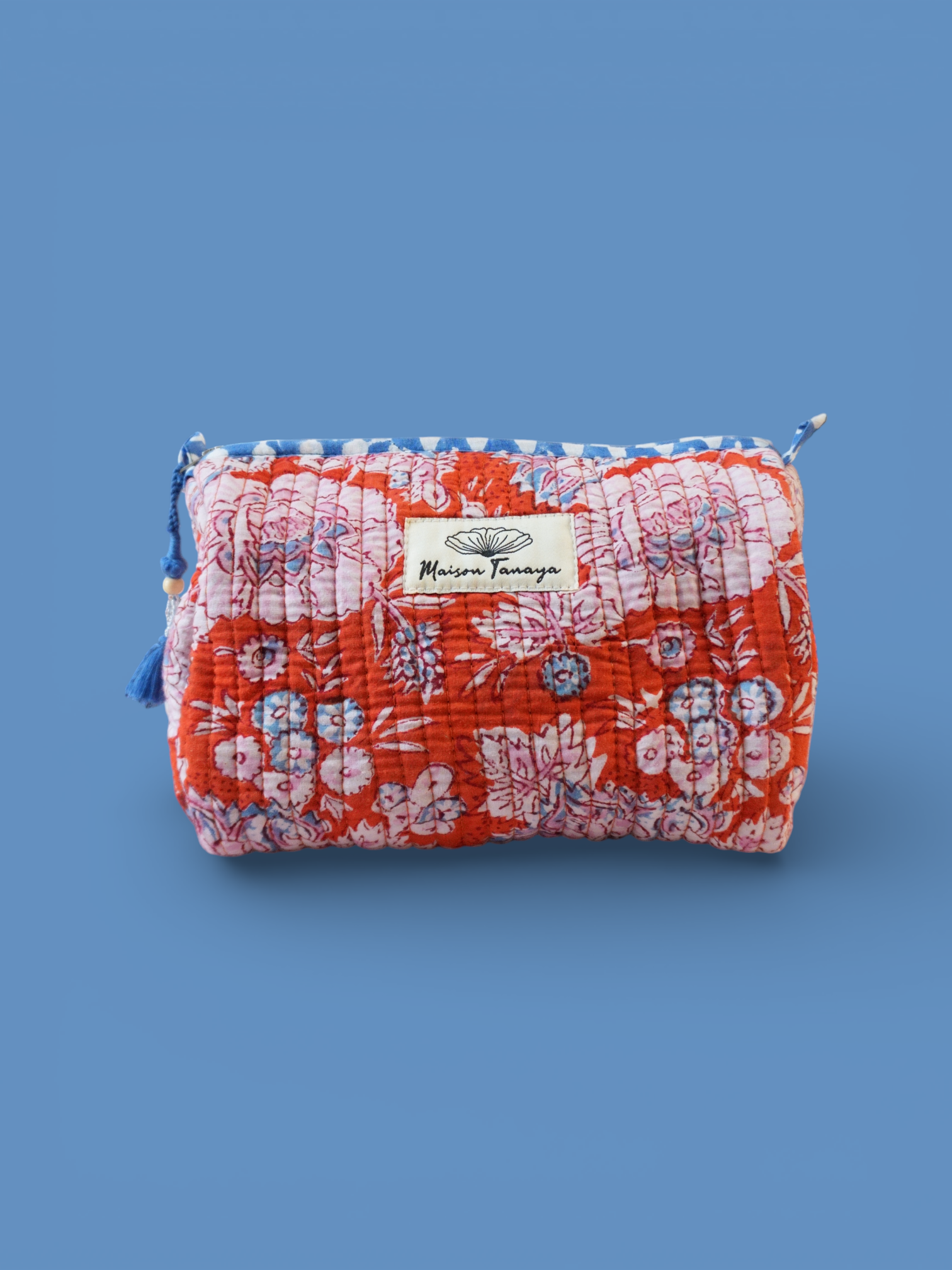 Devi Tangerine toiletries bag