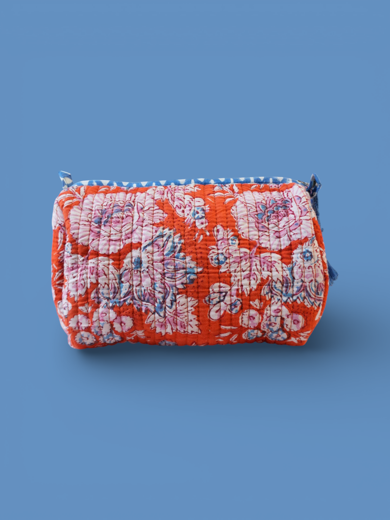 Devi Tangerine toiletries bag