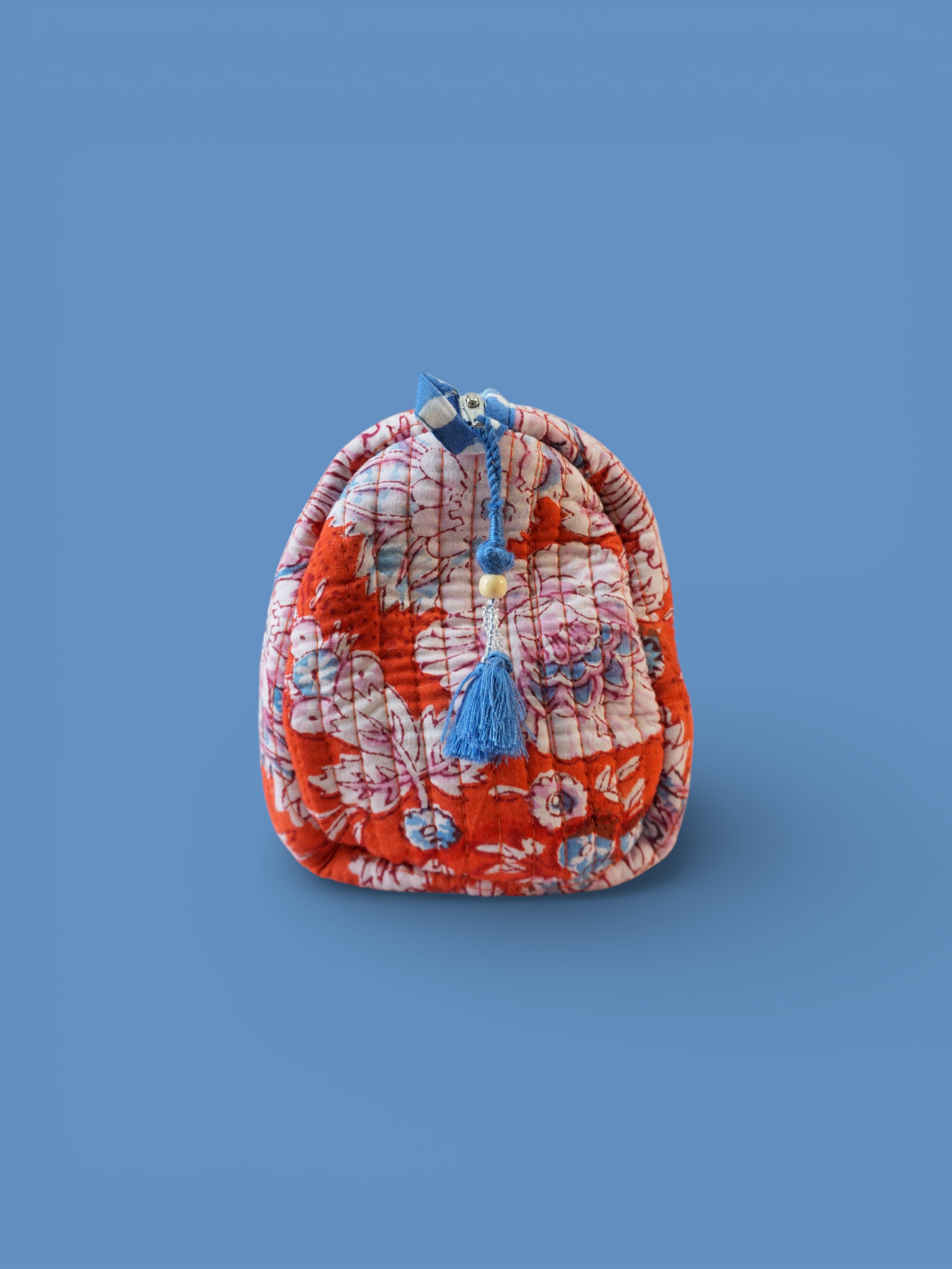 Devi Tangerine toiletries bag