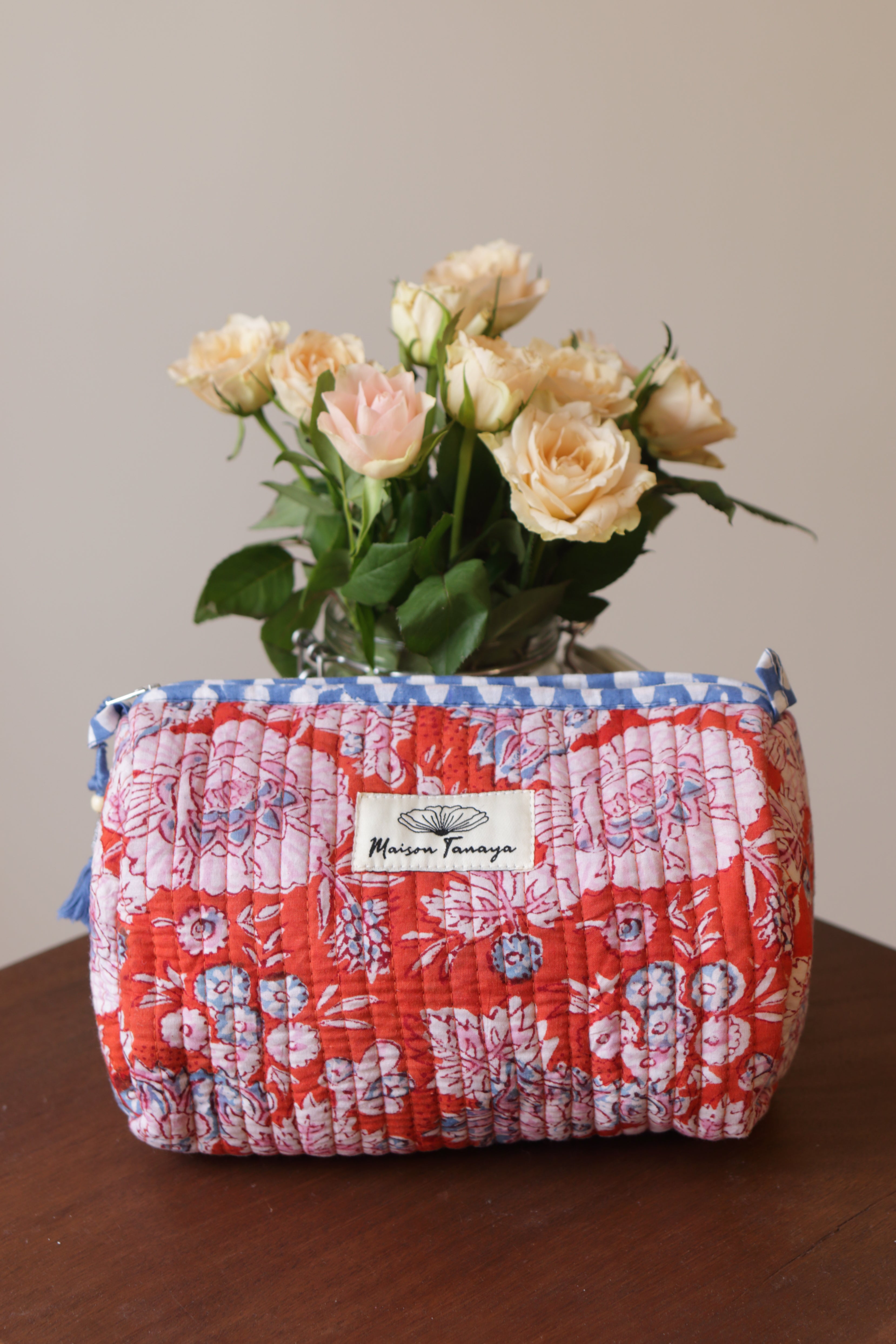 Devi Tangerine toiletries bag