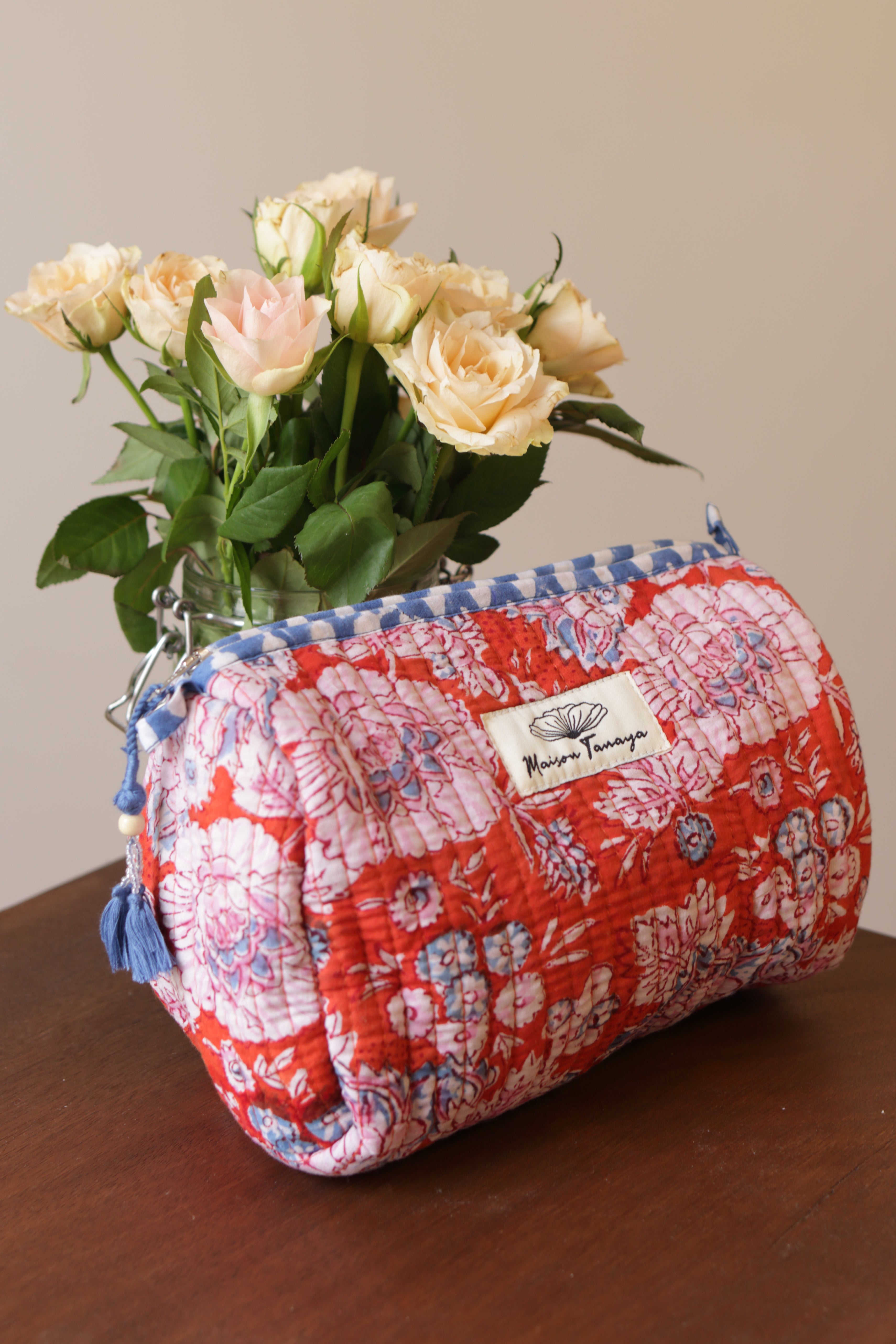 Devi Tangerine toiletries bag