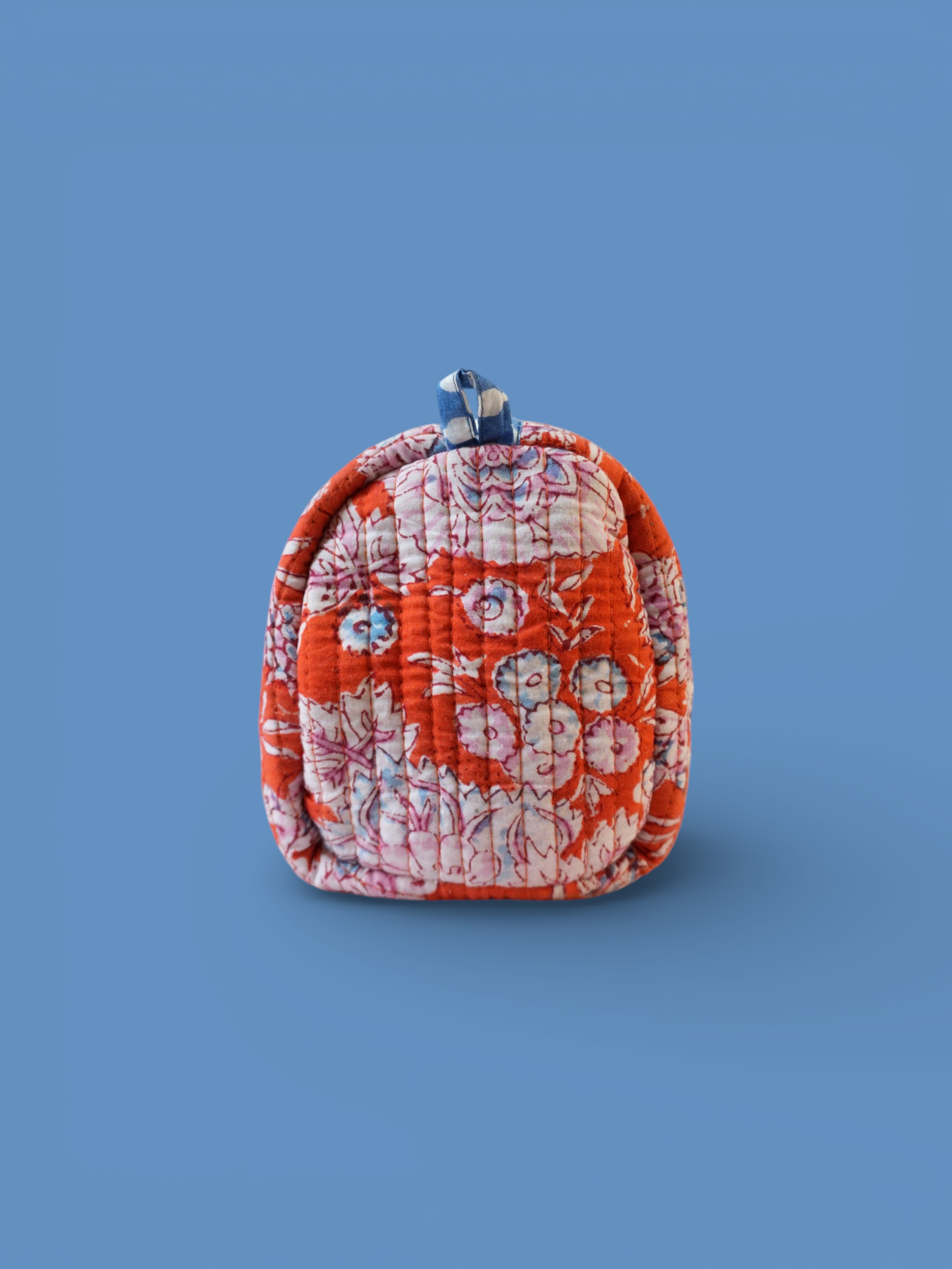 Devi Tangerine toiletries bag