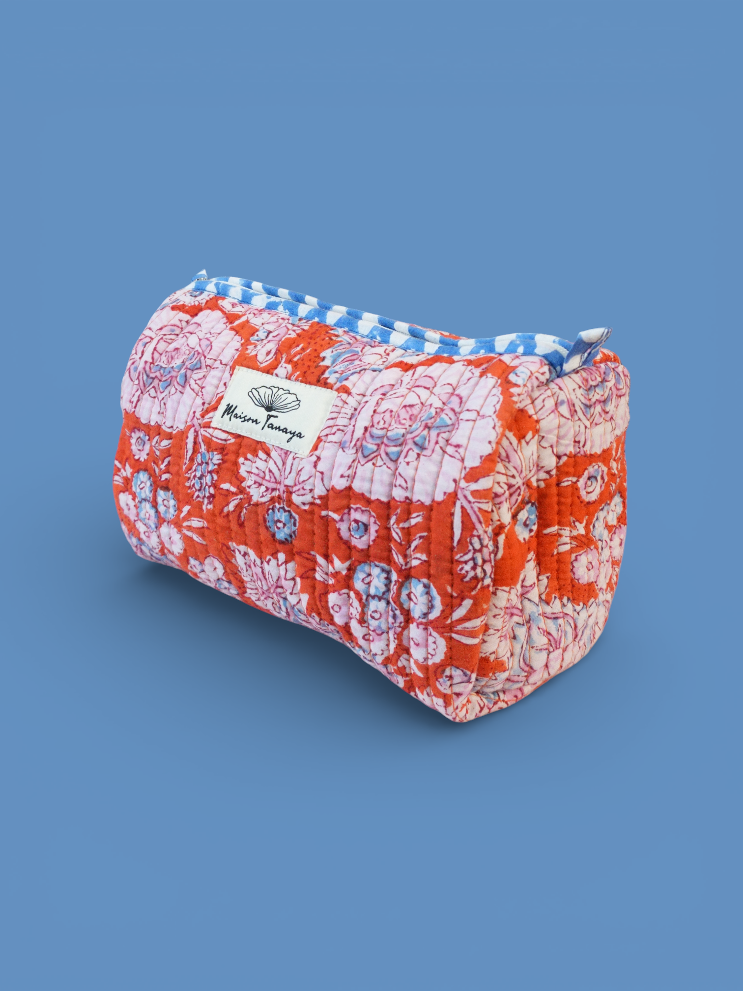 Devi Tangerine toiletries bag
