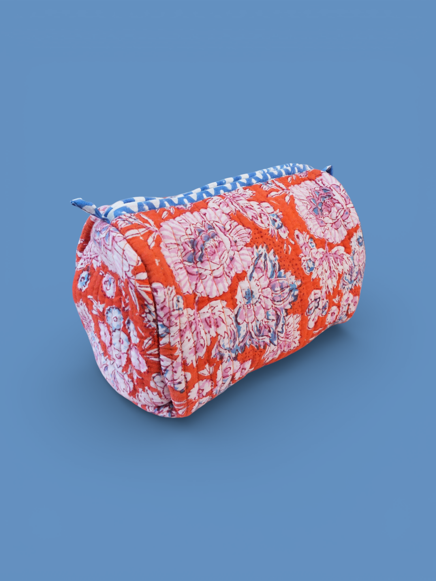 Devi Tangerine toiletries bag